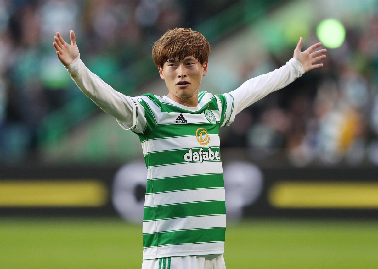 Celtic star Kyogo Furuhashi seems impressed as journalist brings