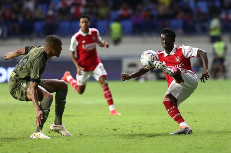 AC Milan's Malick Thiaw in action with Arsenal's Amario Cozier-Duberry