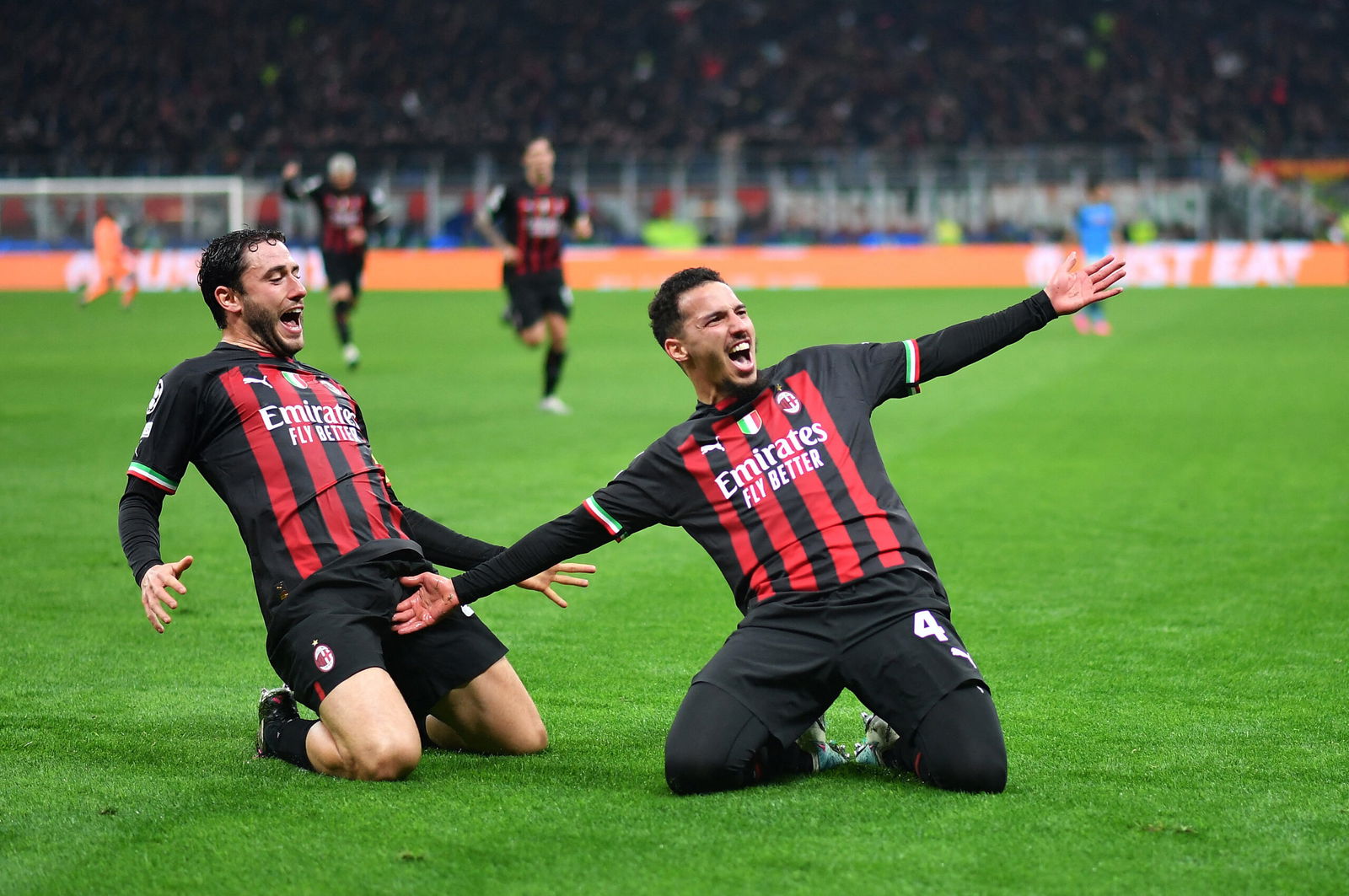 AC Milan's Ismael Bennacer celebrates scoring their first goal with Davide Calabria