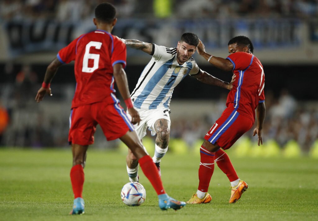 Argentina's Rodrigo de Paul in action with Panama's Jose Murillo