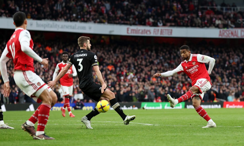Arsenal's Reiss Nelson scores their third goal