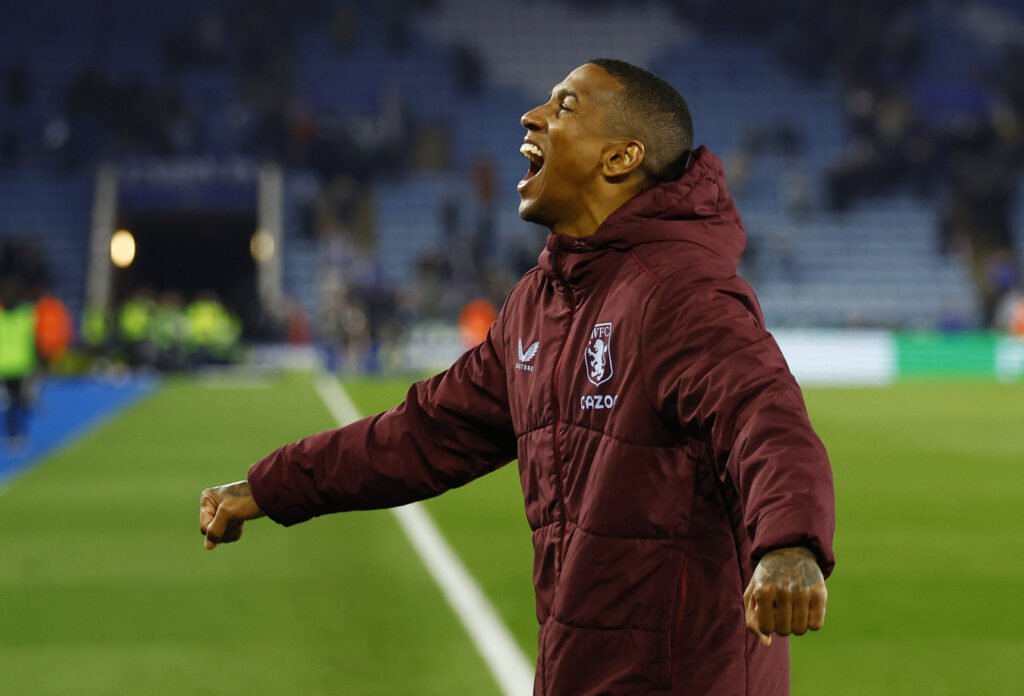 Aston Villa's Ashley Young celebrates after the match