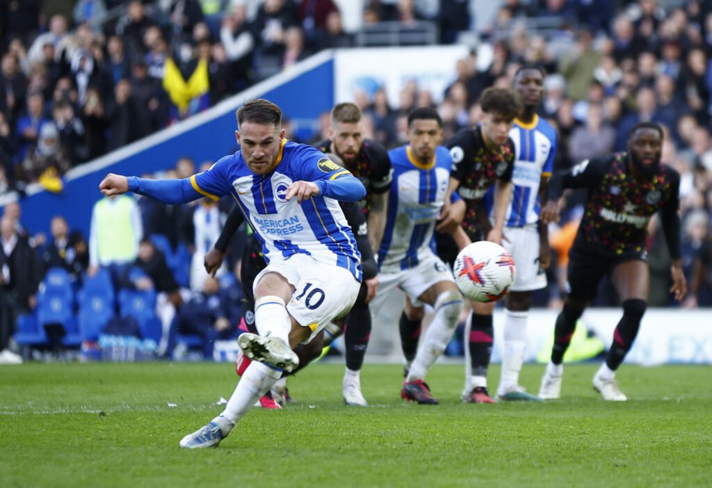 Brighton & Hove Albion's Alexis Mac Allister scores their third goal from the penalty spot