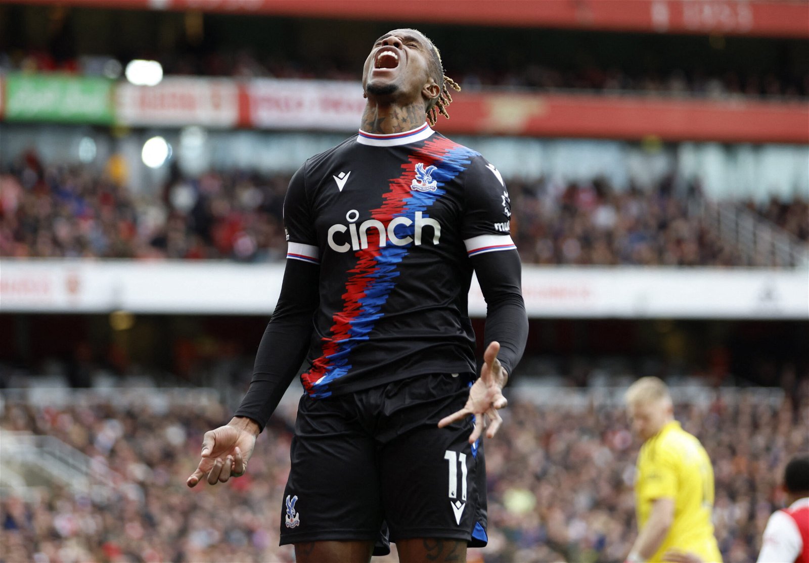 Crystal Palace's Wilfried Zaha reacts after a missed chance