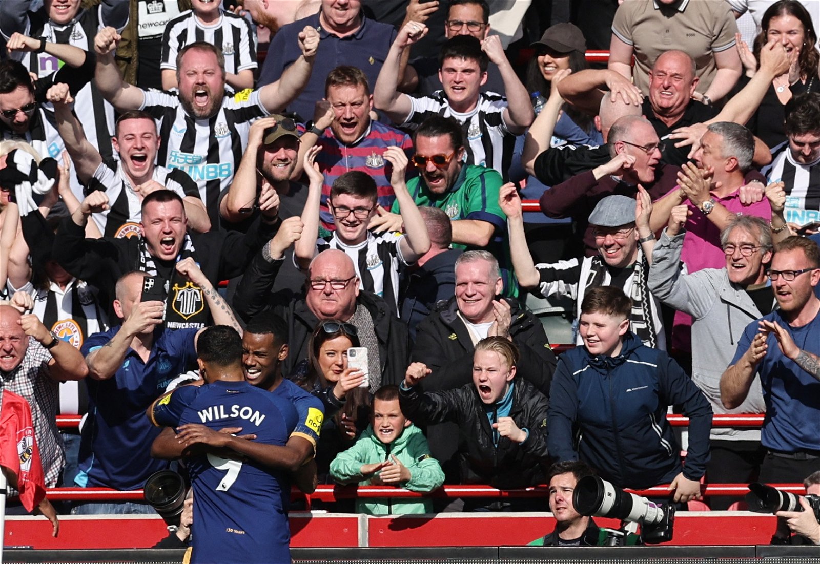 Newcastle United's Alexander Isak celebrates scoring their second goal with Callum Wilson