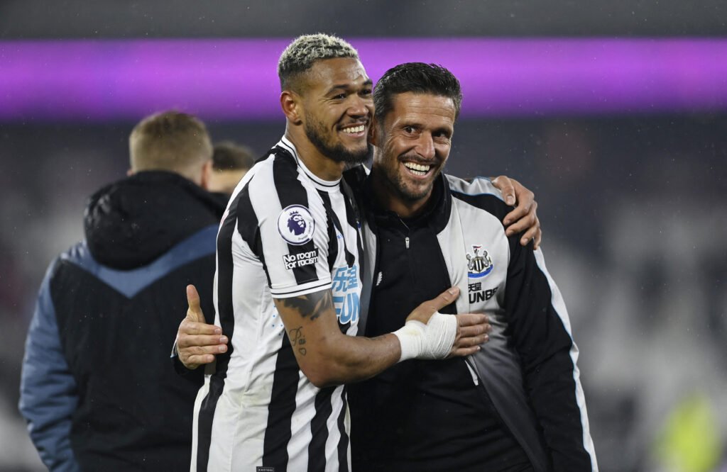 Newcastle United's Joelinton celebrates with assistant manager Jason Tindall after the match