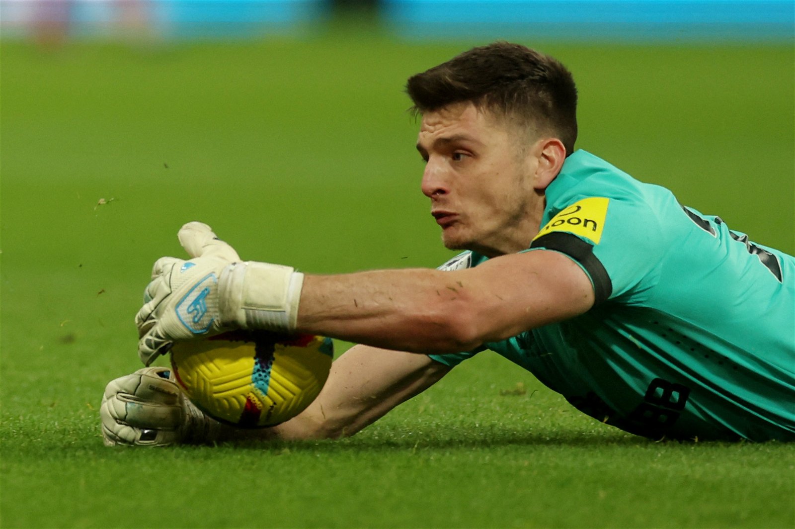 Newcastle United's Nick Pope handles the ball outside the area and is subsequently shown a red card by referee Anthony Taylor
