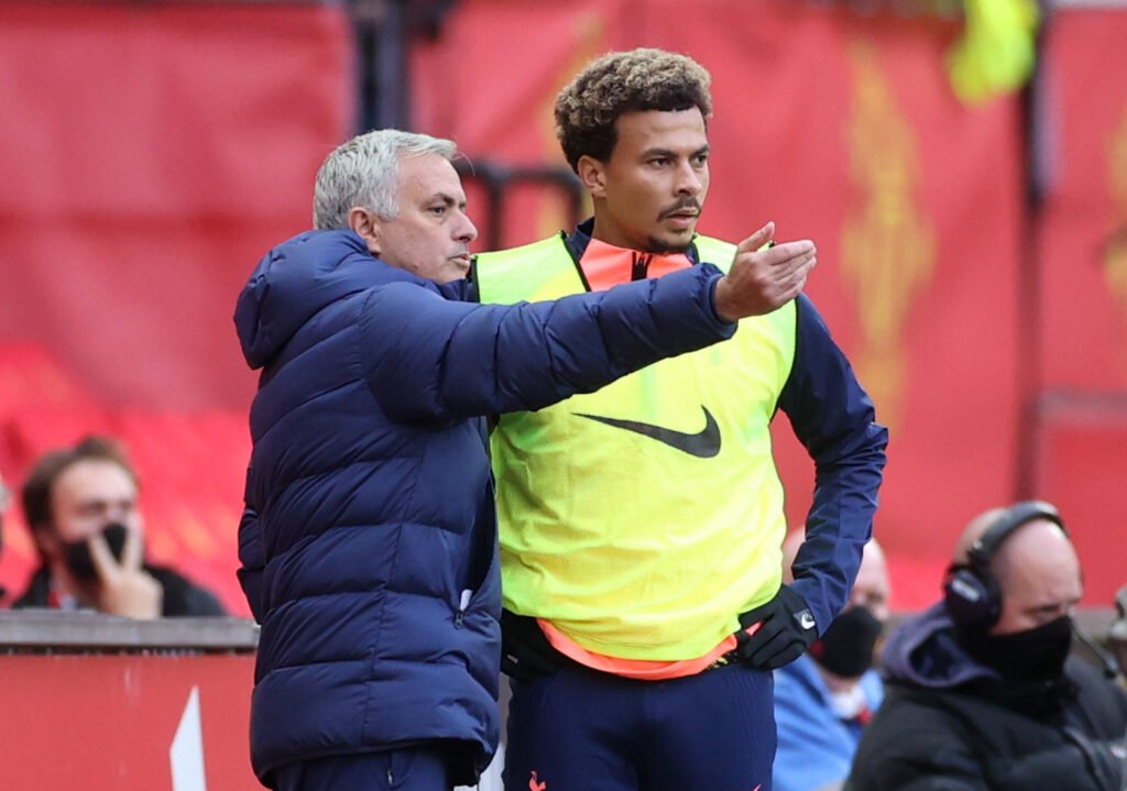 Tottenham Hotspur manager Jose Mourinho speaks with Dele Alli